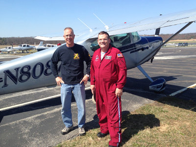 Kyle Takakjian and Bruce Fenstermacher visit at Wings Field (KLOM)